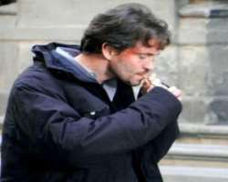 Hugh Dancy smoking